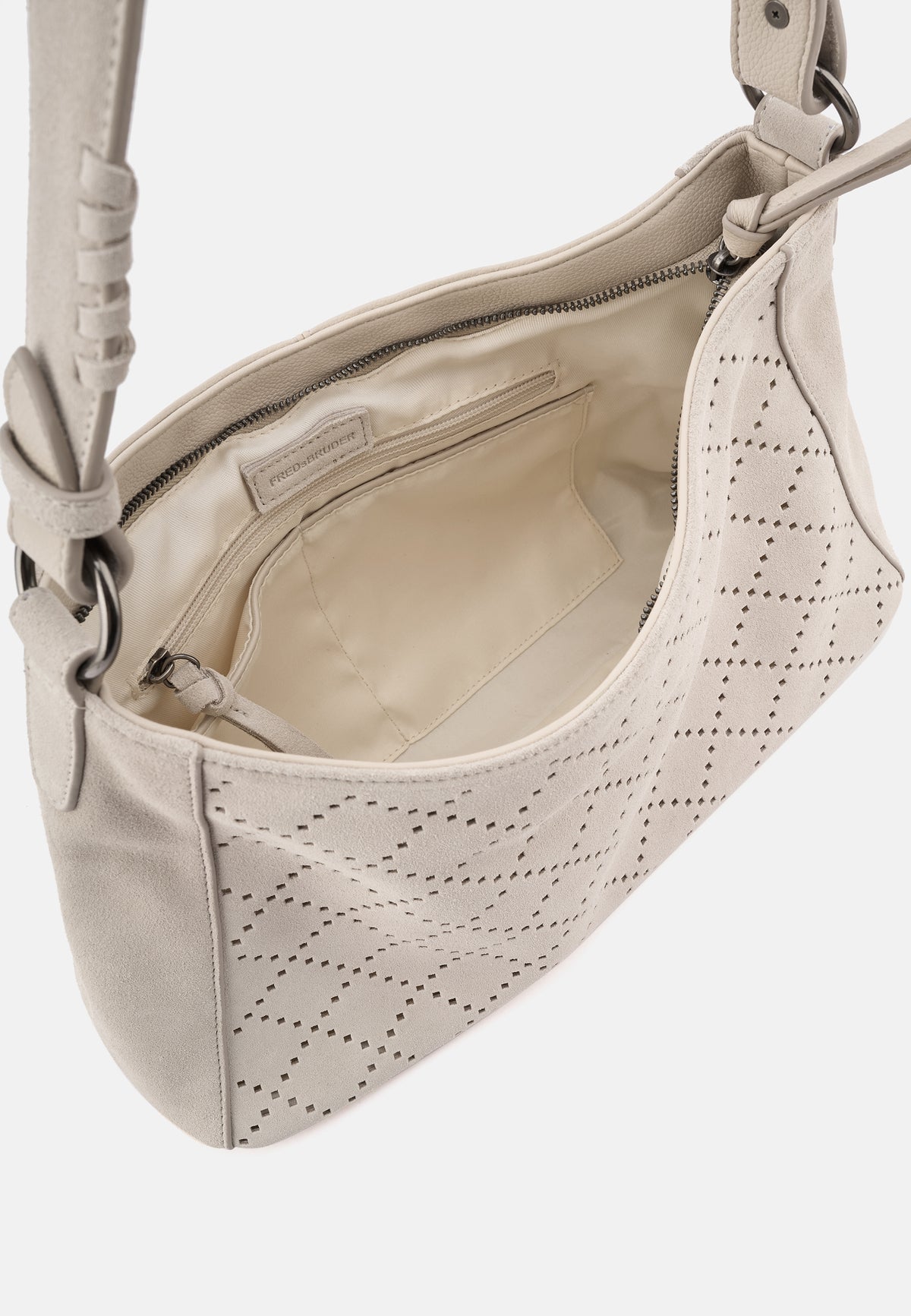Innenansicht Schultertasche mit Reißverschluss, beigem Innenfutter und Seitennaht