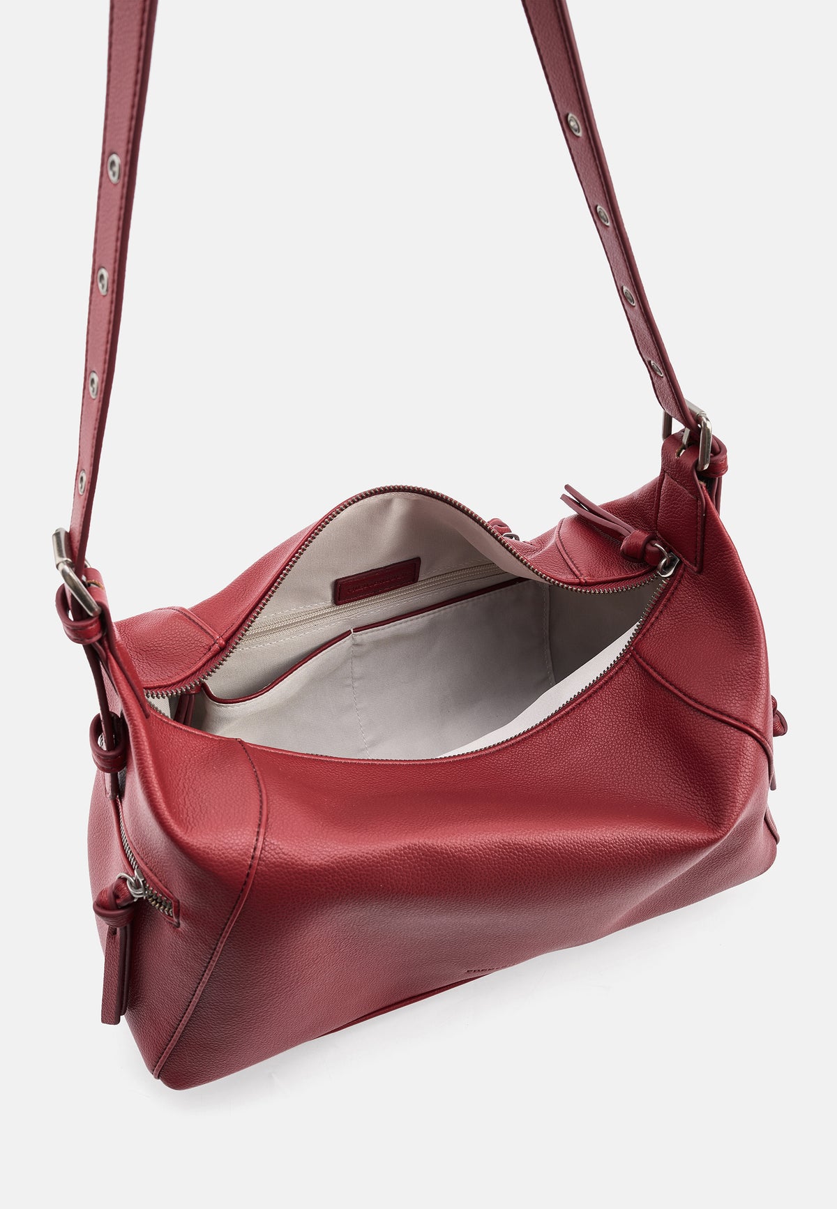Schultertasche aus Lederimitat in Bordeauxrot, Innenansicht mit Trennfach und Reißverschluss